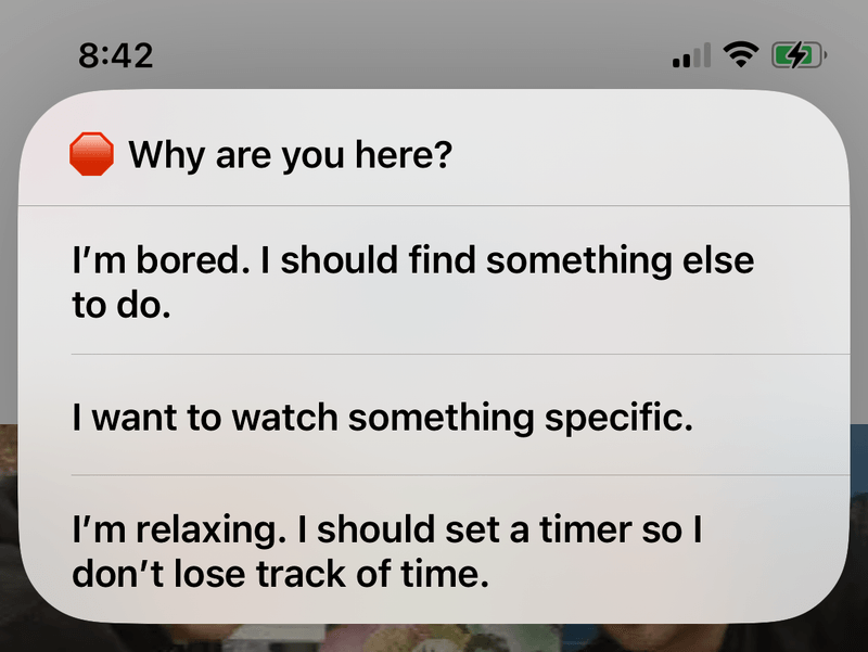 iPhone screenshot of a notification menu. The prompt says, "Why are you here?" There are three options: "I'm bored. I should find something else to do." "I want to watch something specific." "I'm relaxing. I should set a timer so I don't lose track of time."